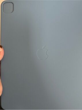 a light blue Apple Smart Folio case for an iPad Pro 12.9
